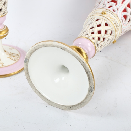 118 - A pair of late 19th century pierced white glaze porcelain vases, with gilded decoration and cranberr... 