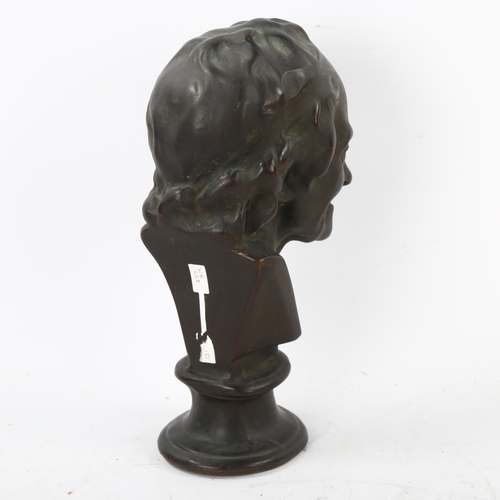 124 - A 19th century patinated bronze head and shoulders bust of Voltaire, unsigned, height 22cm