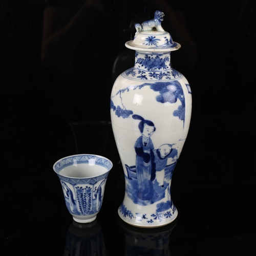 132 - A Chinese blue and white porcelain vase and cover, decorated with children playing, 4 character mark... 