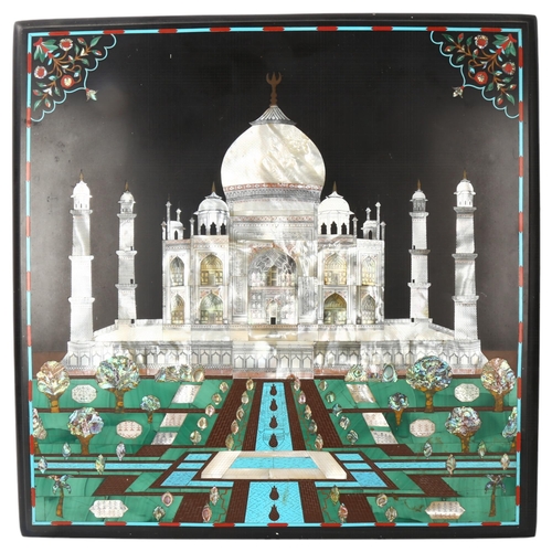 133 - An Indian slate plaque with inlaid mother-of-pearl turquoise and gemstone set study of the Taj Mahal... 