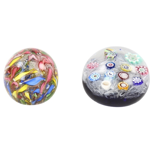 134 - A Perthshire glass paperweight with goat design cane, diameter 7cm, and a Murano End-Of-The Day mill... 