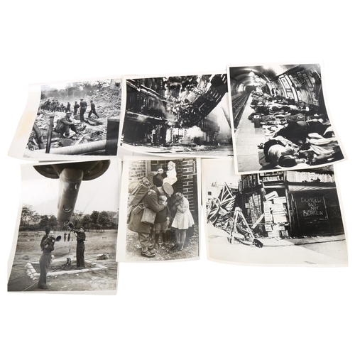 14 - A collection of original Second World War Period press photographs depicting scenes in the Blitz, ma... 