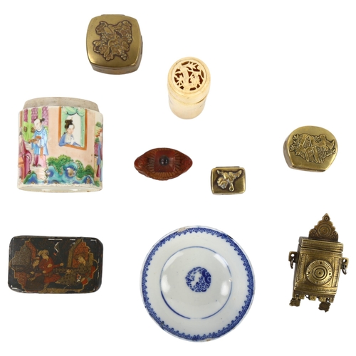 141 - A group of Oriental items, including 3 small brass boxes, a bone cylindrical cricket box etc (9)