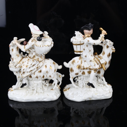 146 - A pair of 19th century Derby figures riding goats, height 14cm