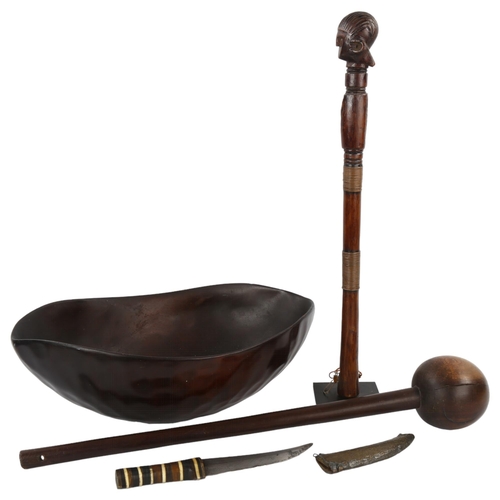 149 - An African hardwood knobkerry club, length 60cm, an African carved wood figure, inlaid knife and bow... 