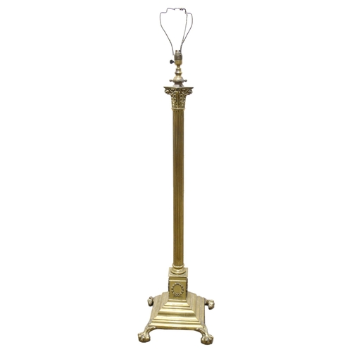 153 - A Victorian brass Corinthian column standard lamp, converted to electric, height to top of column 12... 