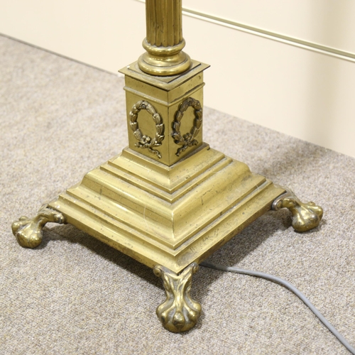 153 - A Victorian brass Corinthian column standard lamp, converted to electric, height to top of column 12... 