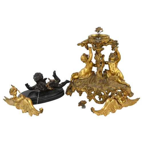 160 - A 19th century gilt-bronze table centre supported by cherubs, height 25cm, pair of gilt-bronze winge... 