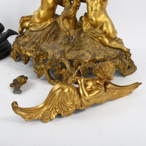 160 - A 19th century gilt-bronze table centre supported by cherubs, height 25cm, pair of gilt-bronze winge... 