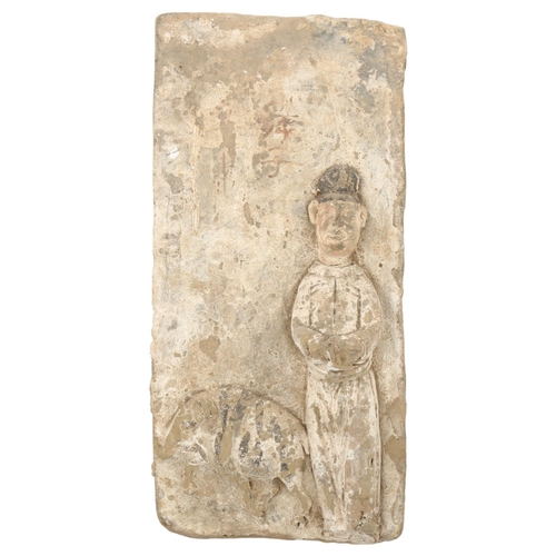 165 - A large Chinese relief moulded pottery wall tile, possibly Jin Dynasty, height 35cm