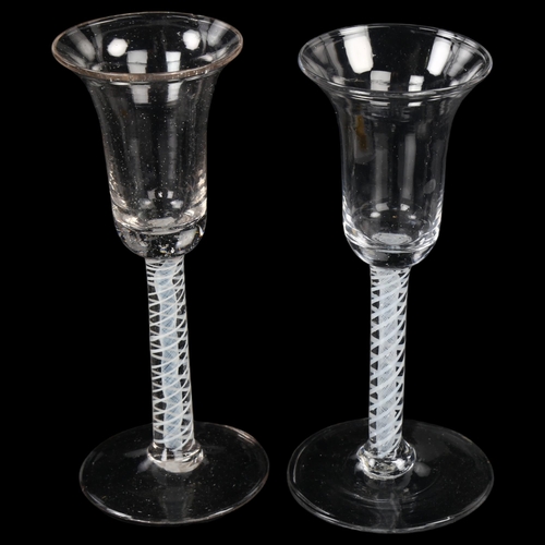 176 - 2 similar 18th century cordial glasses with milk twist stems, height 17cm