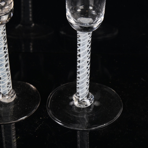 176 - 2 similar 18th century cordial glasses with milk twist stems, height 17cm