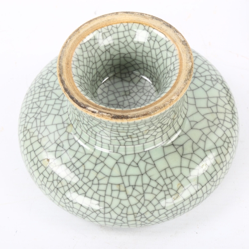 179 - A Chinese celadon crackle glaze Ge-type stemmed bowl, diameter 16cm, on carved wood stand, overall h... 