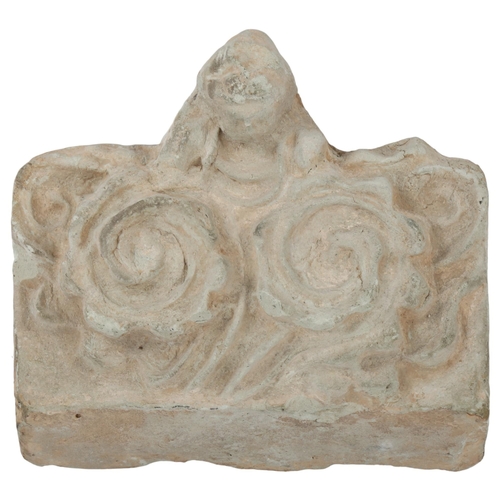 180 - An Ancient terracotta antefix (roof tile), probably Roman, width 21cm, height 20cm