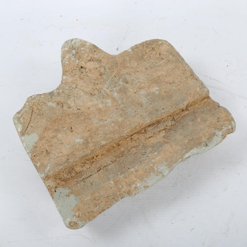 180 - An Ancient terracotta antefix (roof tile), probably Roman, width 21cm, height 20cm