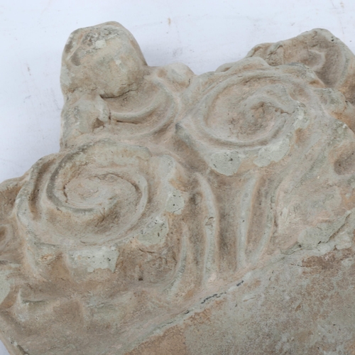 180 - An Ancient terracotta antefix (roof tile), probably Roman, width 21cm, height 20cm