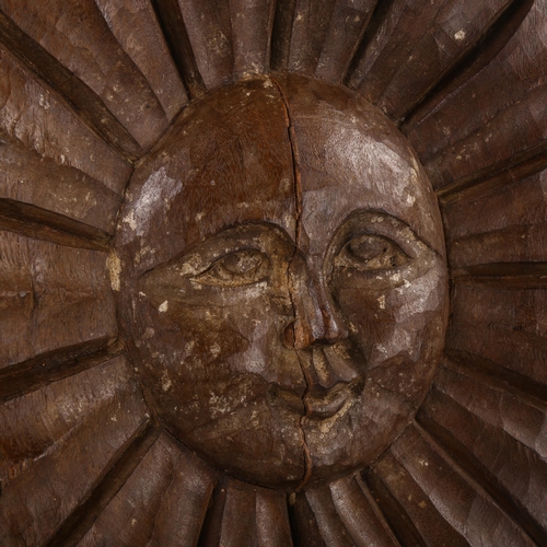 182 - A Folk Art carved wood sun motif, diameter 56cm