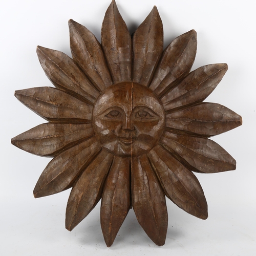 182 - A Folk Art carved wood sun motif, diameter 56cm