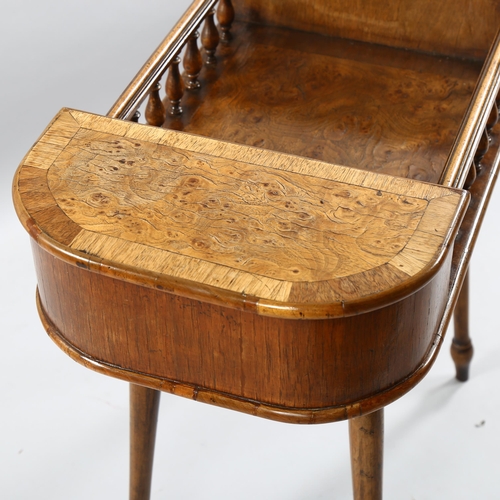 200 - A 19th/20th century walnut work table with burr wood detail, galleried central section and 2 lidded ... 