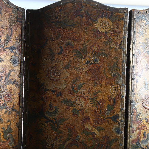 201 - A late 19th century 4-fold screen, with leather-work and brass stud fittings, with decorated floral ... 