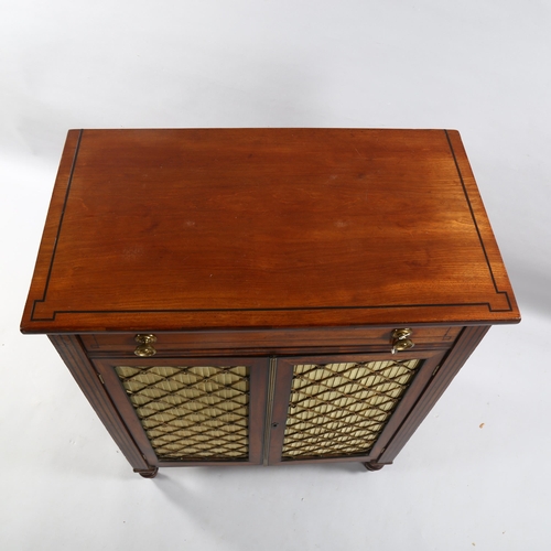 205 - A small Regency mahogany chiffonier, with lattice brass detail on doors, and ebonised insert detail,... 