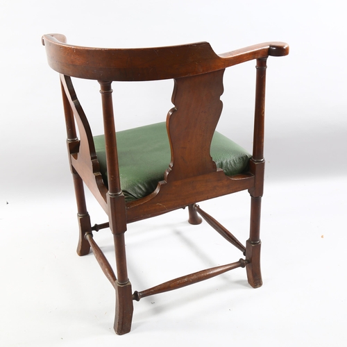 209 - A late 19th century mahogany corner chair, by Heal & Son, with carved splat, Heal label under seat, ... 