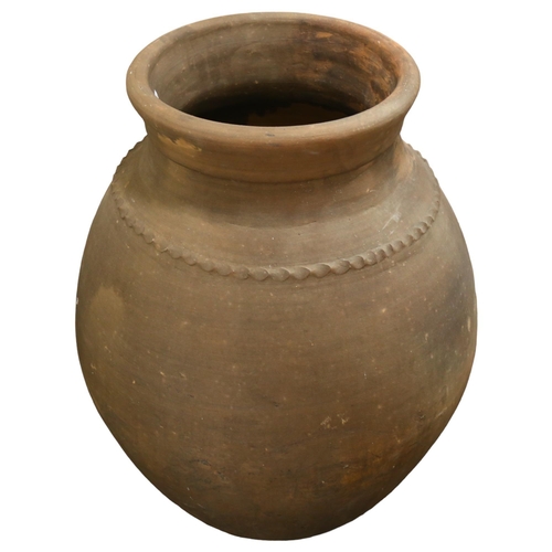 213 - A Mediterranean terracotta oil jar, height 71cm