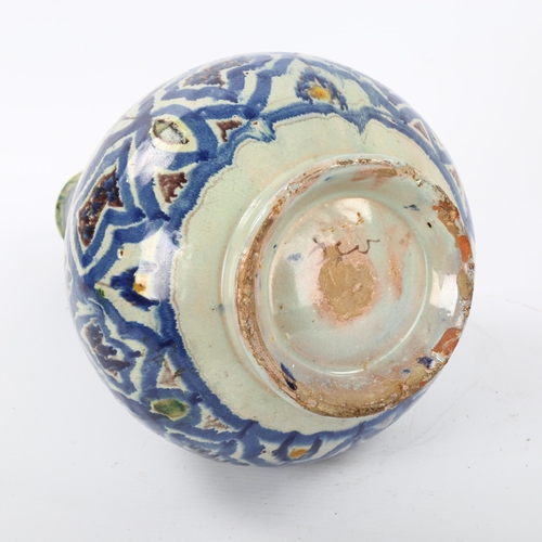 25 - A 19th century Moroccan Islamic pottery double-gourd vase, with painted decoration, height 33cm