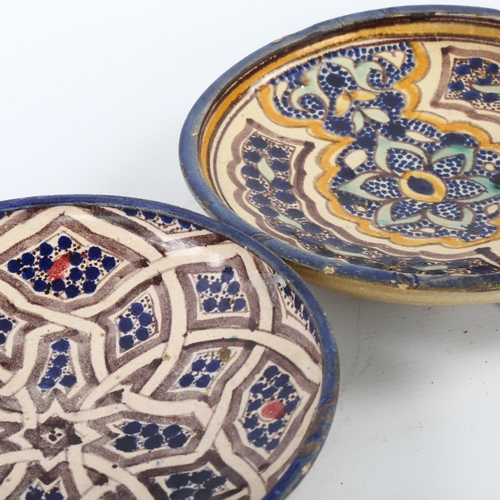 26 - 2 Moroccan Islamic pottery plates with painted decoration, diameter 22cm