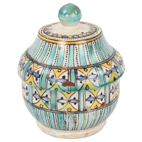 29 - A 19th century Moroccan Islamic pottery Jobbana lidded tureen, height 19cm