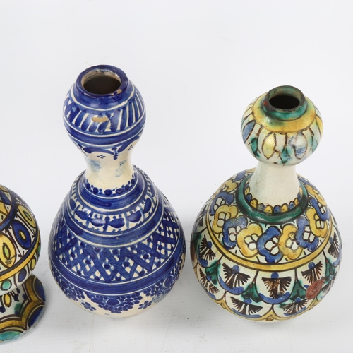 30 - A group of 4 Moroccan Islamic pottery vases, largest height 25cm (4)