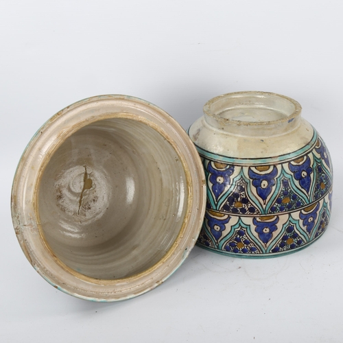 37 - A Moroccan Islamic pottery jar and cover with hand painted decoration, height 33cm