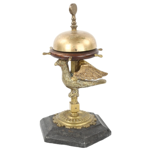 55 - A large Victorian brass and mahogany desk-top bell, operated by a brass and mahogany ship's wheel de... 