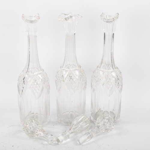 57 - A 19th century electroplate and cut-glass 3-bottle decanter stand, height 46cm