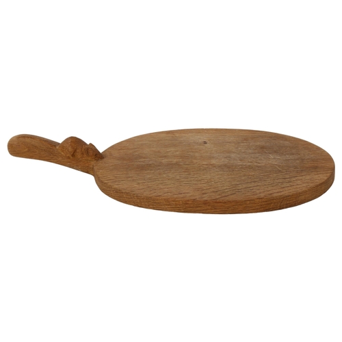 58 - Robert Mouseman Thompson, oak cheese board with carved mouse design handle, length 40cm