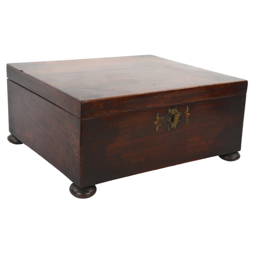 An antique rosewood sewing box with contents
