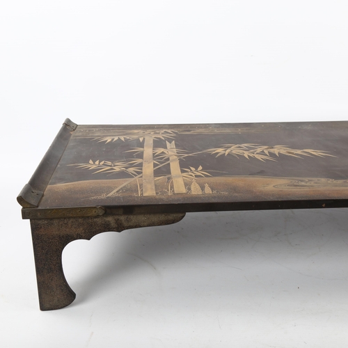 69 - A Japanese lacquer bed tray, with gilded and lacquer bamboo and landscape scene, 65 x 35cm