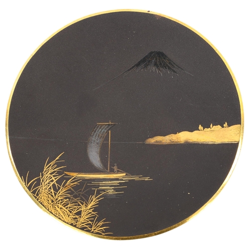 76 - A Japanese Komai metal dish, with inlaid design of Mount Fuji and fishing vessel, seal mark, diamete... 