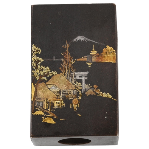 79 - A Japanese Komai metal matchbox holder, inlaid design of Mount Fuji, seal mark, length 6cm