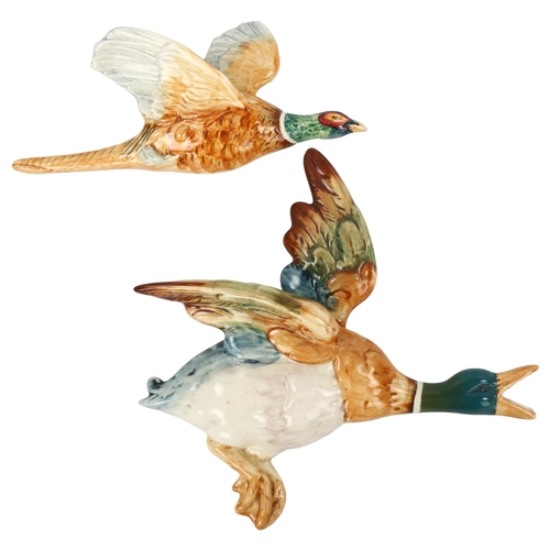 81 - A Beswick pottery flying duck wall ornament, length 21cm, and Beswick flying pheasant, length 21cm