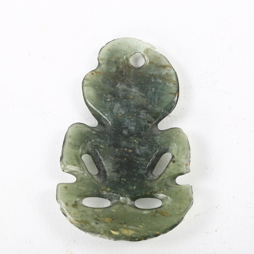 83 - A Maori nephrite Hei Tiki pendant, length 6cm