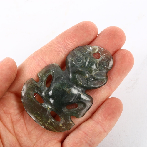 83 - A Maori nephrite Hei Tiki pendant, length 6cm