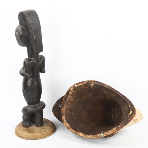 94 - A Gabon Punu carved wood mask, and a Gabon Fang reliquary figure, height 40cm (2)