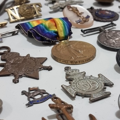 129 - A group of militaria, including pair of Great War Service medals to 20100 Dvr WT Waller Royal Artill... 