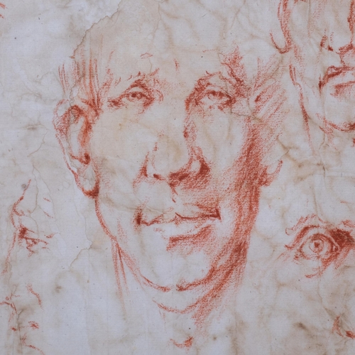 637 - A sheet of 18th century sanguine chalk portrait sketches, 38cm x 26cm, unframed