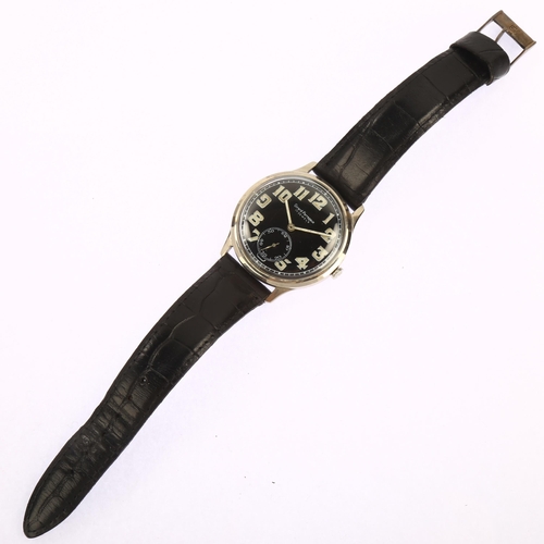 1009 - GIRARD-PERREGAUX - a stainless steel pilot's mechanical wristwatch, circa 1940s, black dial with lum... 