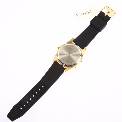 1012 - BULOVA - a gold plated stainless steel Classic Sports quartz wristwatch, ref. 98B261, black dial wit... 