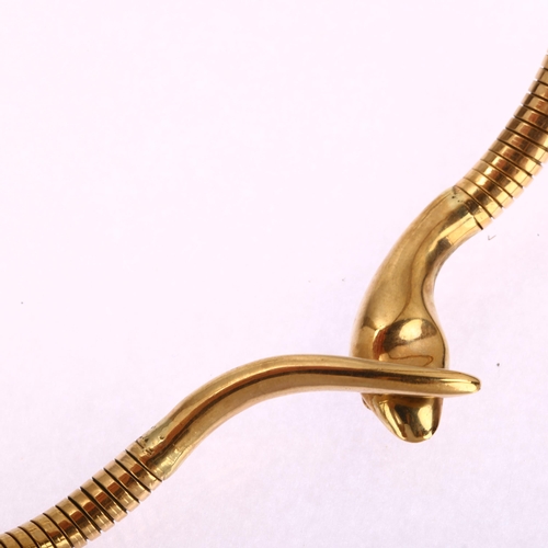 1101 - A mid-20th century 9ct gold ruby figural snake necklace, engrave head with gas-pipe body, Smith & Pe... 