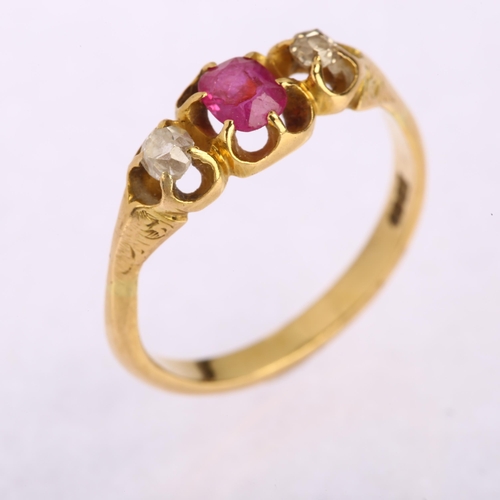 1104 - An early 20th century 18ct gold three stone synthetic ruby and diamond gypsy ring, ruby measures: 4.... 