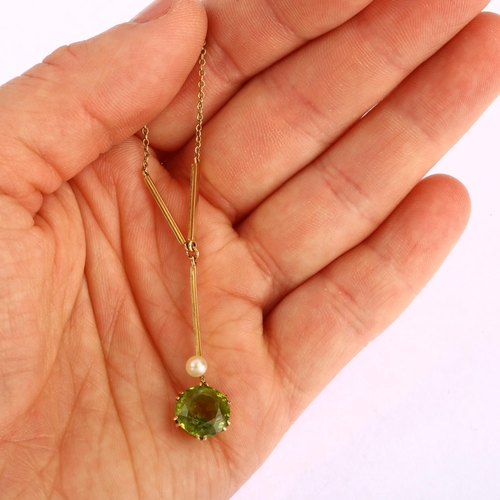 1105 - An Edwardian 15ct gold peridot and pearl drop pendant necklace, set with round-cut peridot, peridot ... 